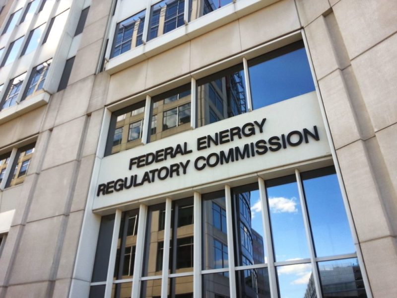 a sign above a bank of windows: "Federal Energy Regulatory Commission"