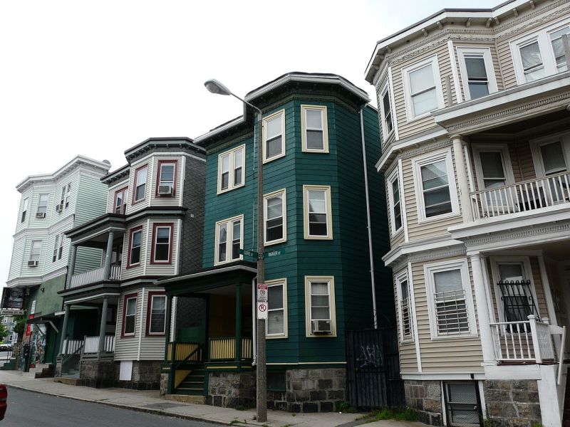 A row of triple-decker homes in Boston, Massachusetts.