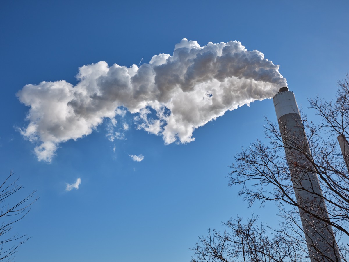 Smokestacks of the Clifty Creek Generating Station against a blue sky.