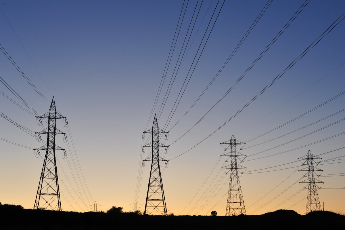 Transmission towers at sunset